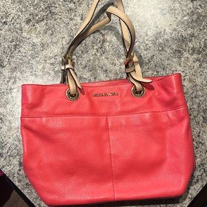 Pink leather MK bag.